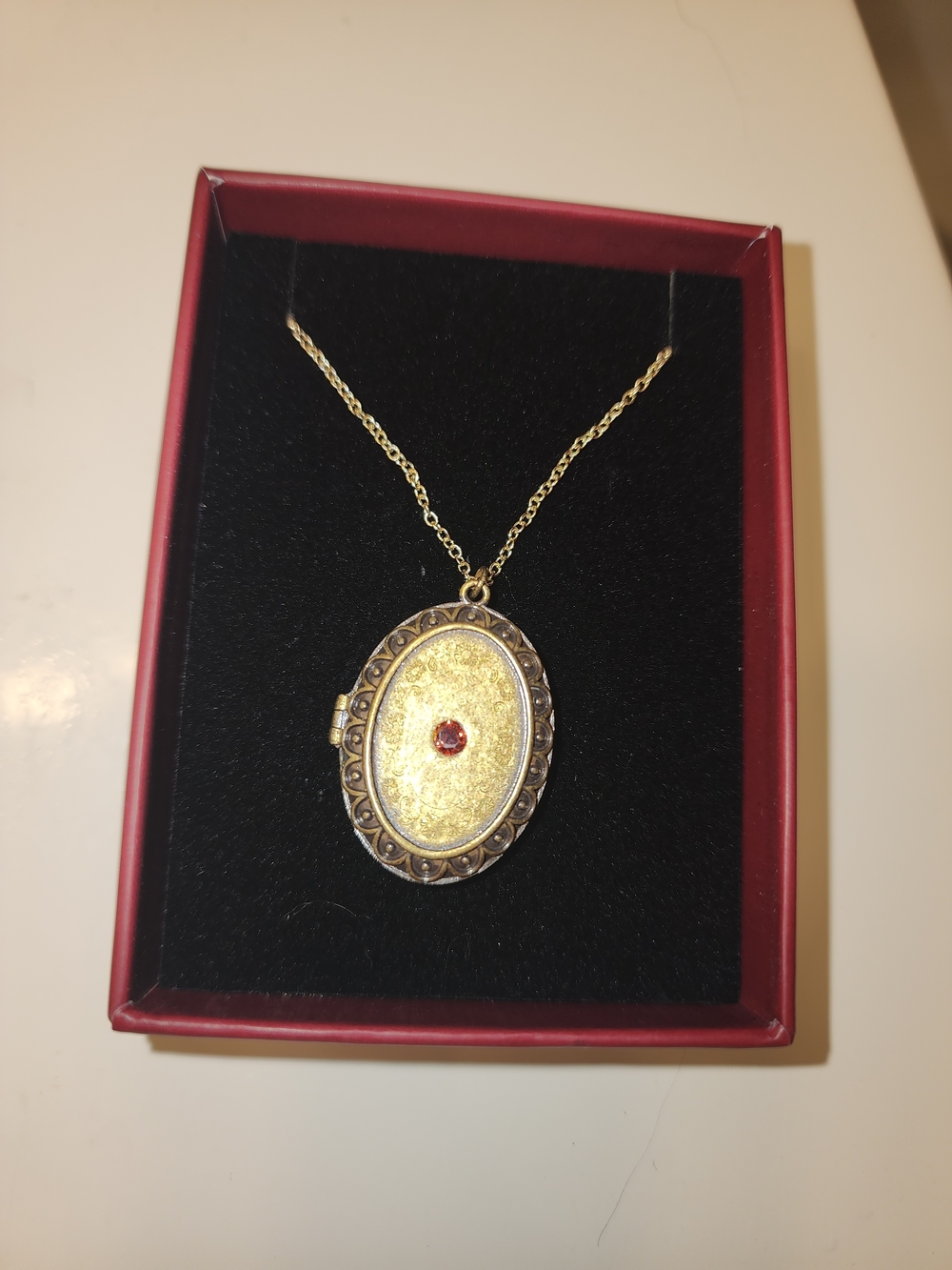 Taylor Swift Gold-Tone Oval Locket Necklace with Red Stone